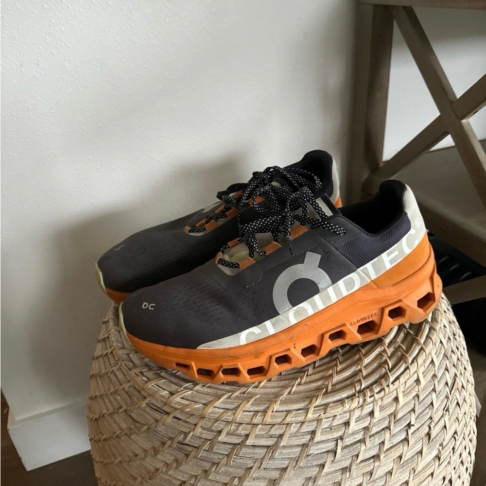 On Running Cloudflow Men's Running Shoes in Black and Orange